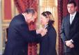 Le Président de la République remet à Melle Carole Montillet les insignes de chevalier dans l'Ordre de la Légion d'Honneur.
