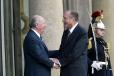 Le Président de la République accueille M. Ricardo Lagos Escobar, Président de la République du Chili (perron)