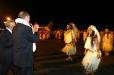 Accueil traditionnel du Président de la République à l'aéroport de Tahiti-Faa'a en compagnie de M. Gaston Flosse, Sénateur, Président du Gouvernement de la Polynésie française