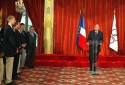 Photo : Intervention du Président de la République lors de la réception offerte en l'honneur des médaillés français aux Jeux Olympiques d'Athènes (salle des fêtes)